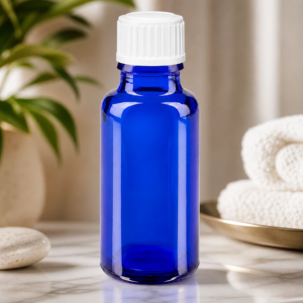 Hochwertige blaue 20ml Tropfflasche aus UV-Schutzglas mit weißem Deckel