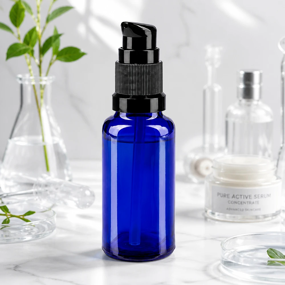 Apothekenflasche blau 20ml PumpVerschluss schwarz Standard Kleine kobaltblaue 20ml Glasflasche mit schwarzem Pumpkopf für präzise Kosmetikdosierung
