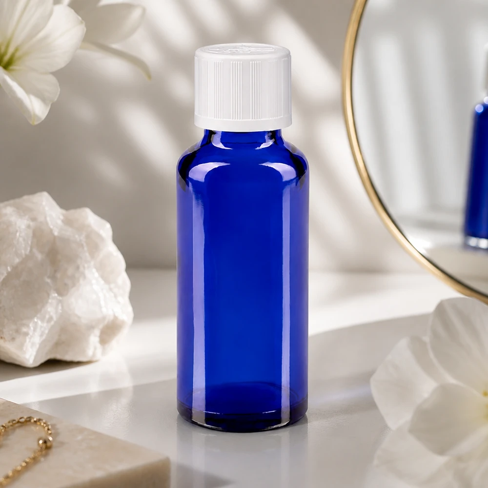 Apothekenflasche blau 30ml Schraubverschluss weiß Kindersicherung Standard Blaue 30ml Apothekerflasche mit 11mm Kindersicherheitsdeckel für Aromatherapie und Naturkosmetik