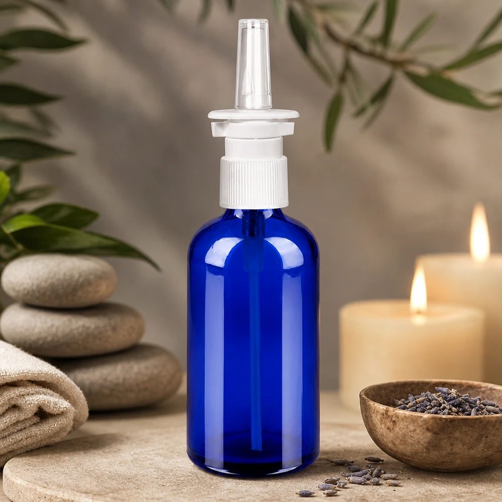 Langlebige 100ml Sprayflasche mit UV-Schutz durch blaues Glas und präzisem Sprühkopf