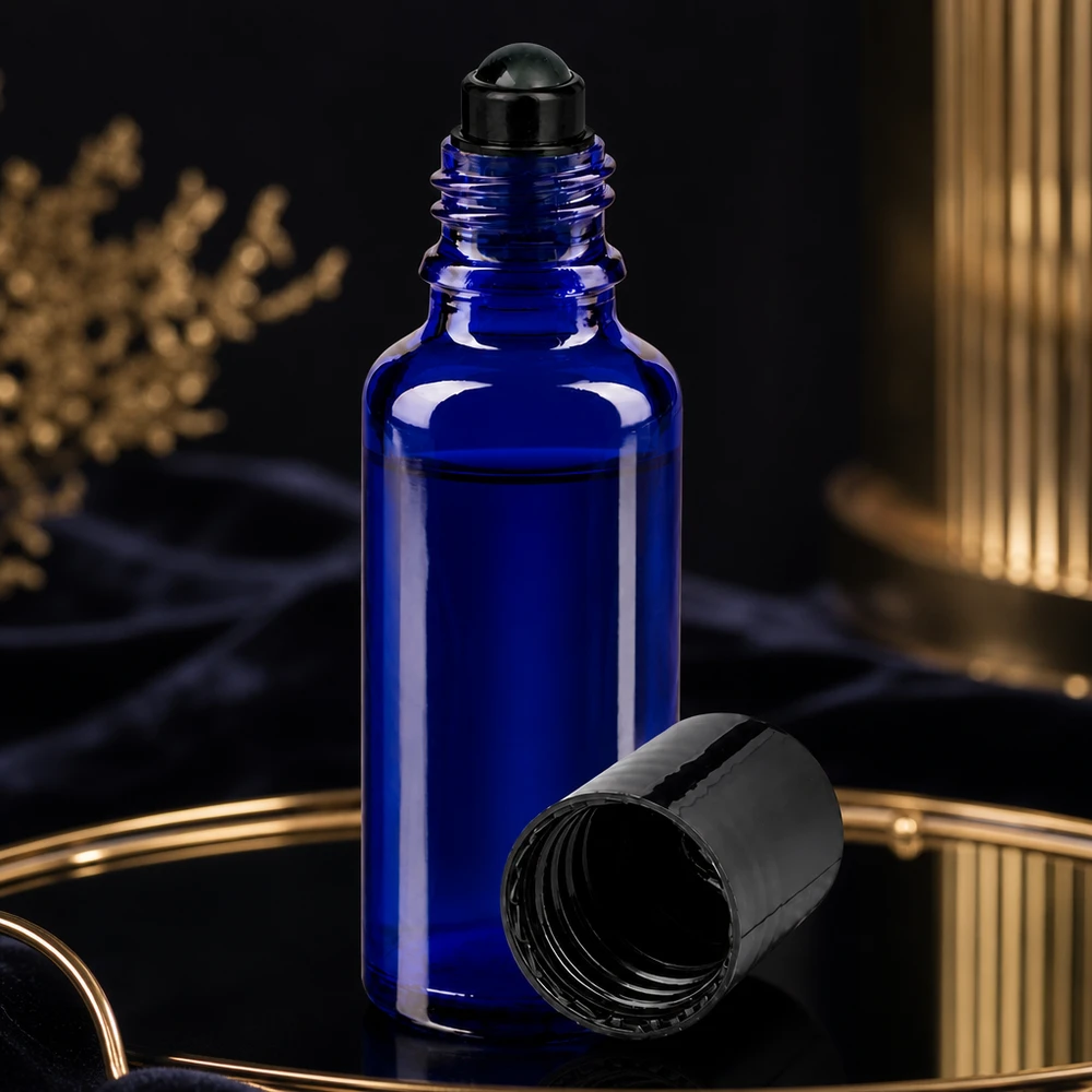 Hochwertige blaue Roll-On Flasche aus UV-Schutzglas 30ml mit schwarzem Applikator