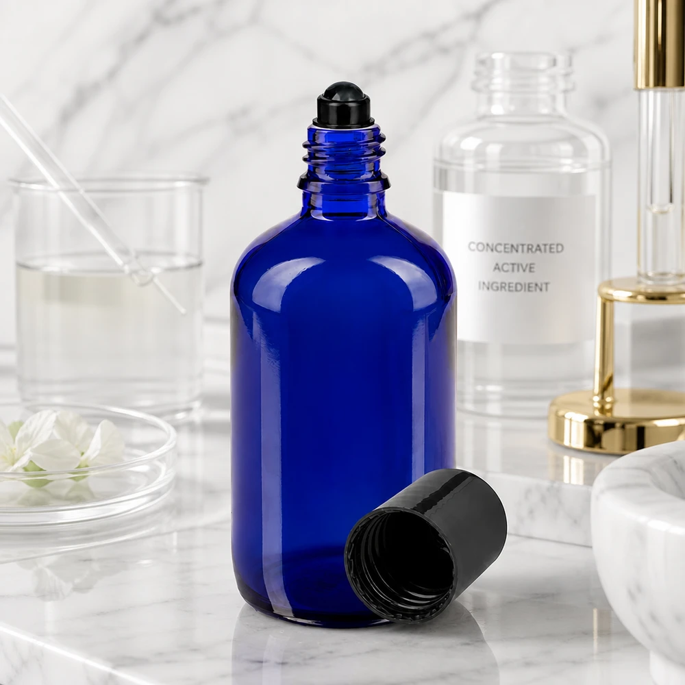 Hochwertige 100ml Roll-On Glasflasche in Blau mit schwarzem Deckel für professionelle Anwendung