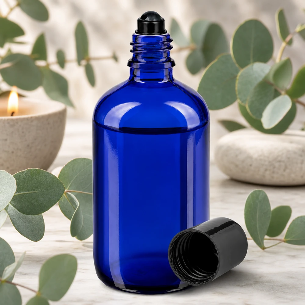 Lichtschutz-Glasflasche 100ml in Blau mit schwarzem Roll-On Aufsatz für ätherische Öle