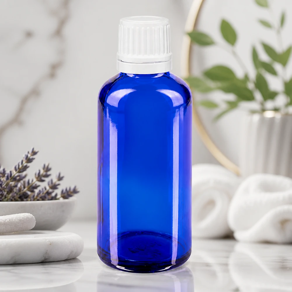 Apothekenflasche blau 50ml Tropfverschluss 1.2mm weiß Originalitätsverschluss Kompakte 50ml Blauglasflasche mit weißem Kindersicherheitsverschluss OV und Tropfer