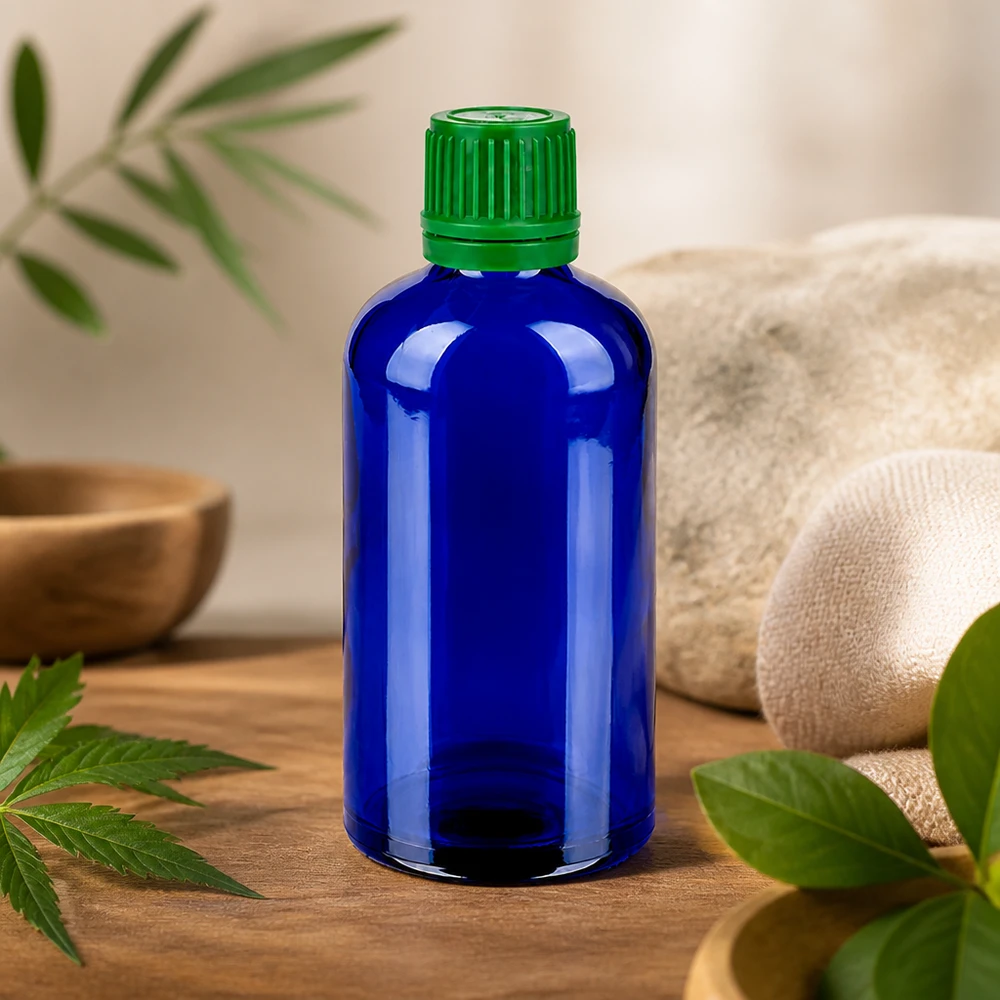 Kompakte 100ml blaue Glasflasche mit kindersicherem grünem Verschluss für sichere Aufbewahrung