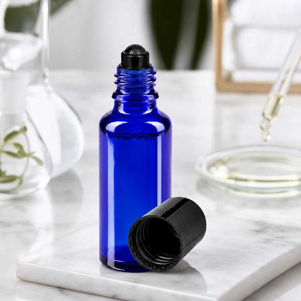 Apothekenflasche blau 30ml Roll-On Verschluss schwarz Zylindrische 30ml Kobaltglas Roll-On Flasche mit schwarzem Schraubverschluss und Rollkugel