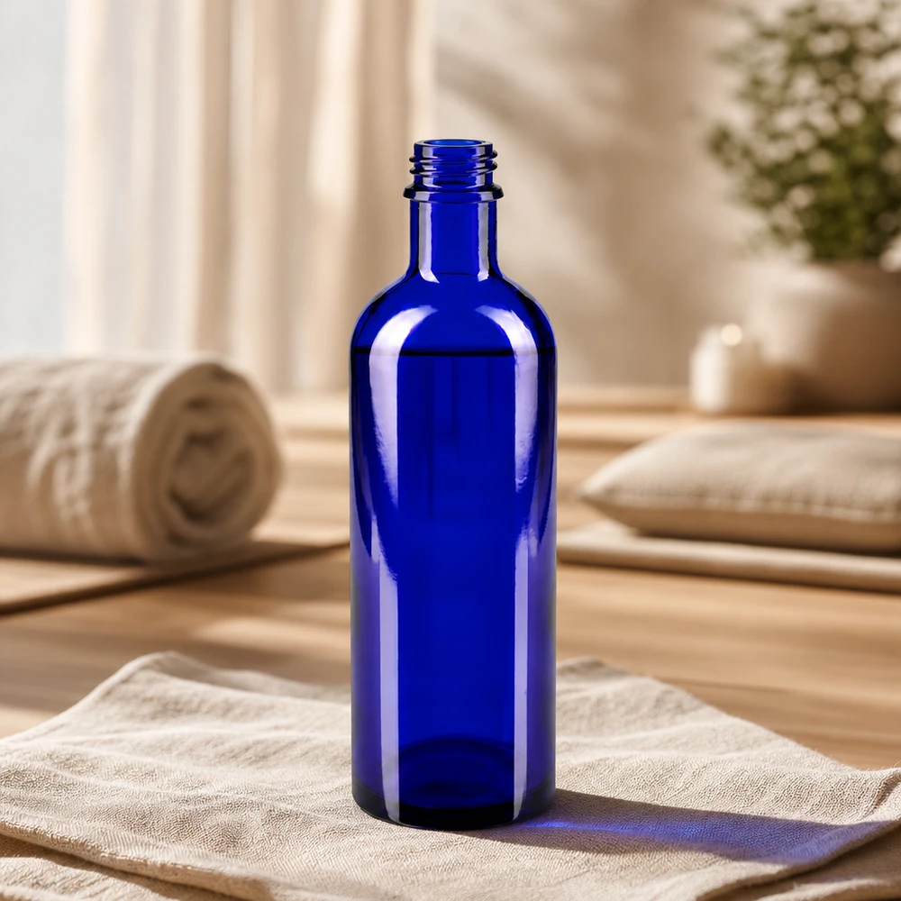 Handliche Tropfflasche 200ml mit blauer Glasoberfläche und optimaler Griffigkeit