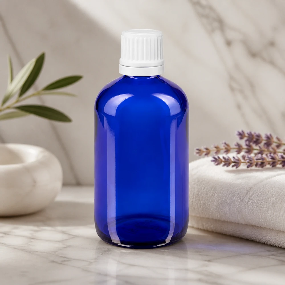 Apothekenflasche blau 100ml Tropfverschluss 1.2mm weiß Originalitätsverschluss Professionelle blaue Apothekerflasche 100ml mit OV-Sicherheitsverschluss in Weiß