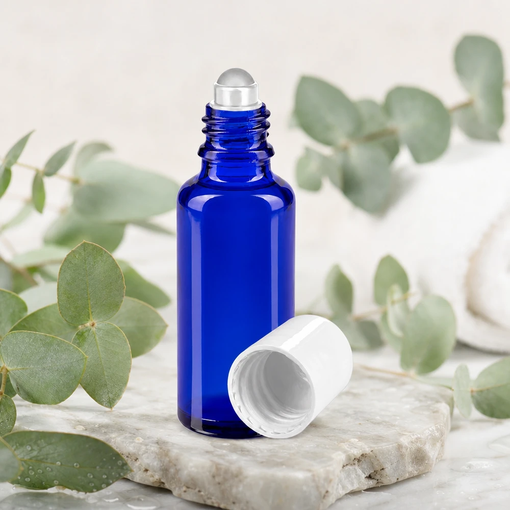Hochwertige kobaltblaue 30ml Glasflasche mit Roll-On Mechanismus und abnehmbarem Weißdeckel