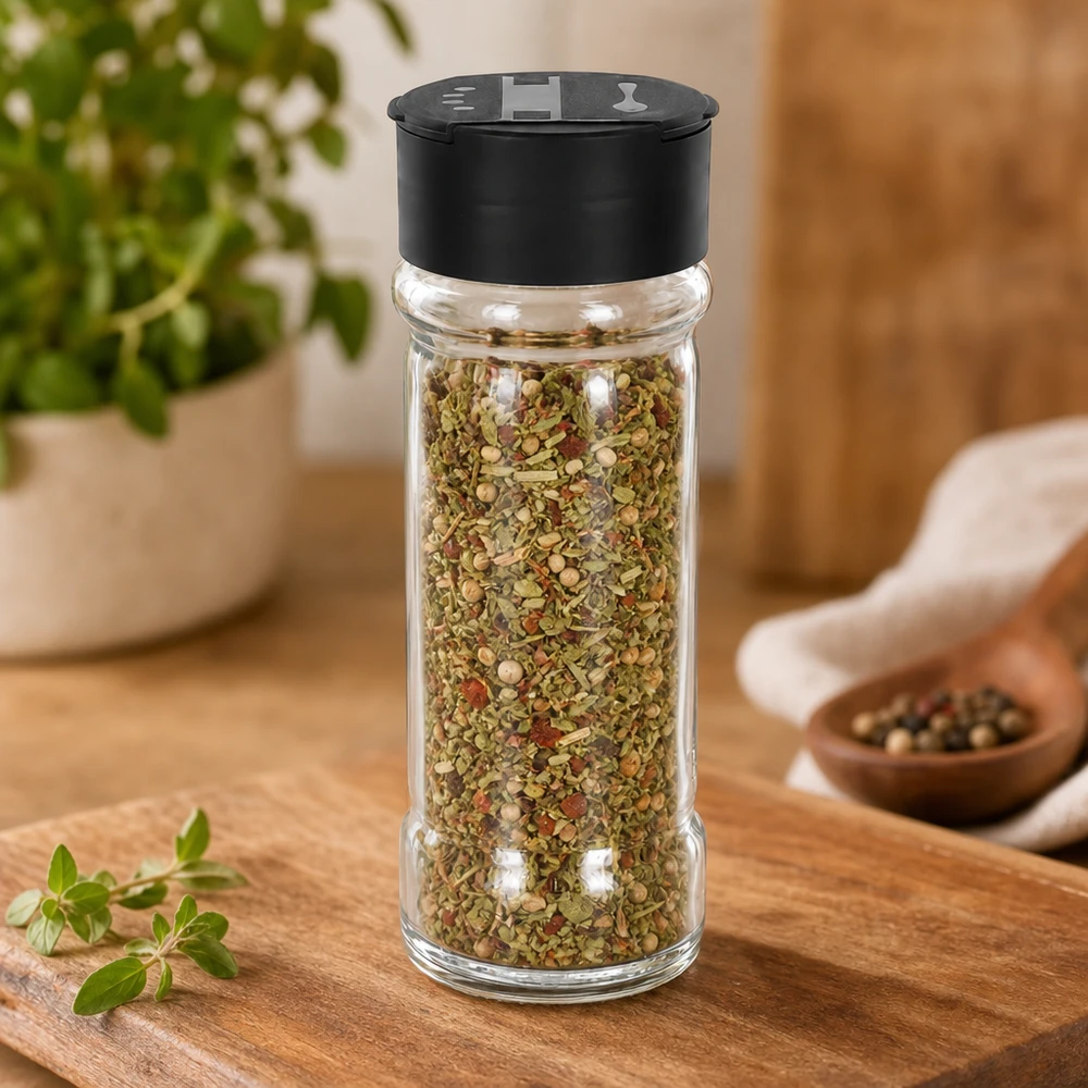 Salz-/Gewürzglas 100ml mit Doppelstreuer schwarz Rundes Gewürzglas 100ml mit grünen Kräutern und roten Flocken befüllt schwarzer Deckel
