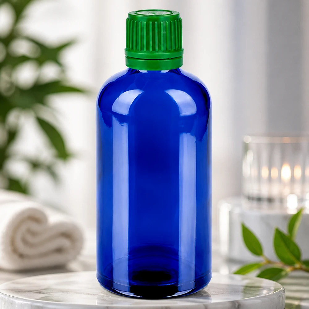 Stilvolle blaue Glasflasche 100ml mit mattgrünem Deckel perfekt für Küchenessenzen und Extrakte