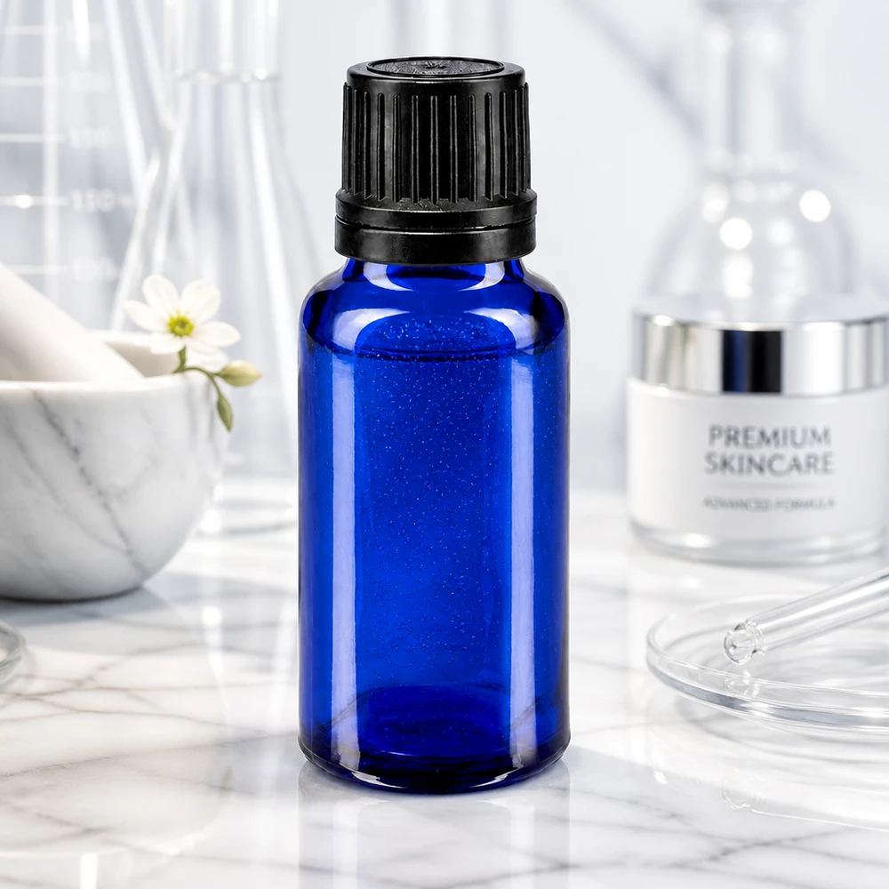 Hochwertige blaue Tropfflasche 20ml ApoGlas mit geripptem Schwarzverschluss für ätherische Öle