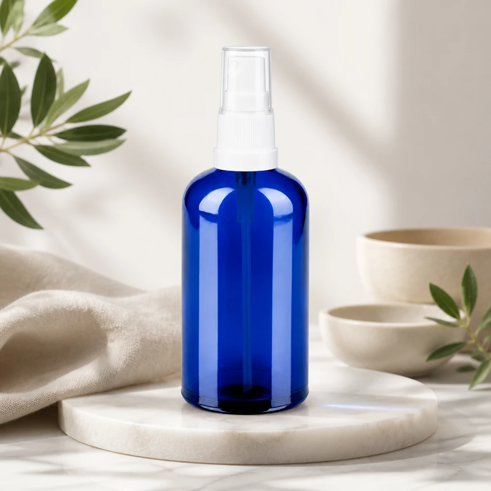 Premium 100ml Glasspray in tiefblau mit UV-Schutz für lichtempfindliche Inhaltsstoffe
