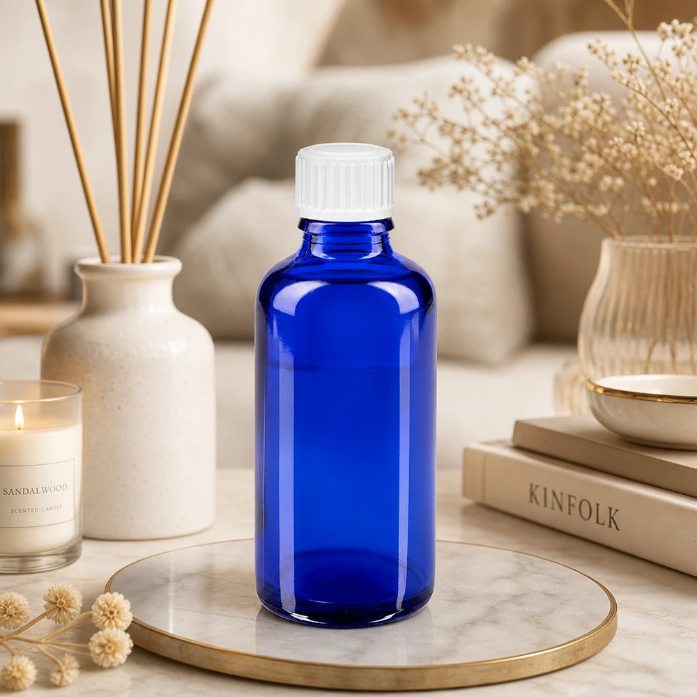 Apothekenflasche blau 50ml Schraubverschluss weiß Standard UV-schützende blaue 50ml Apothekerflasche mit weißem 11mm Verschluss aus Glas
