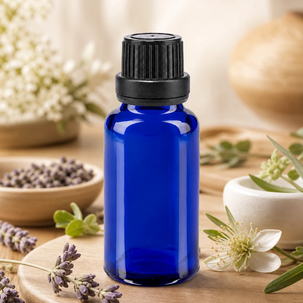 Nachfüllbare blaue Glasflasche 20ml für ätherische Öle mit manipulationssicherem Verschluss