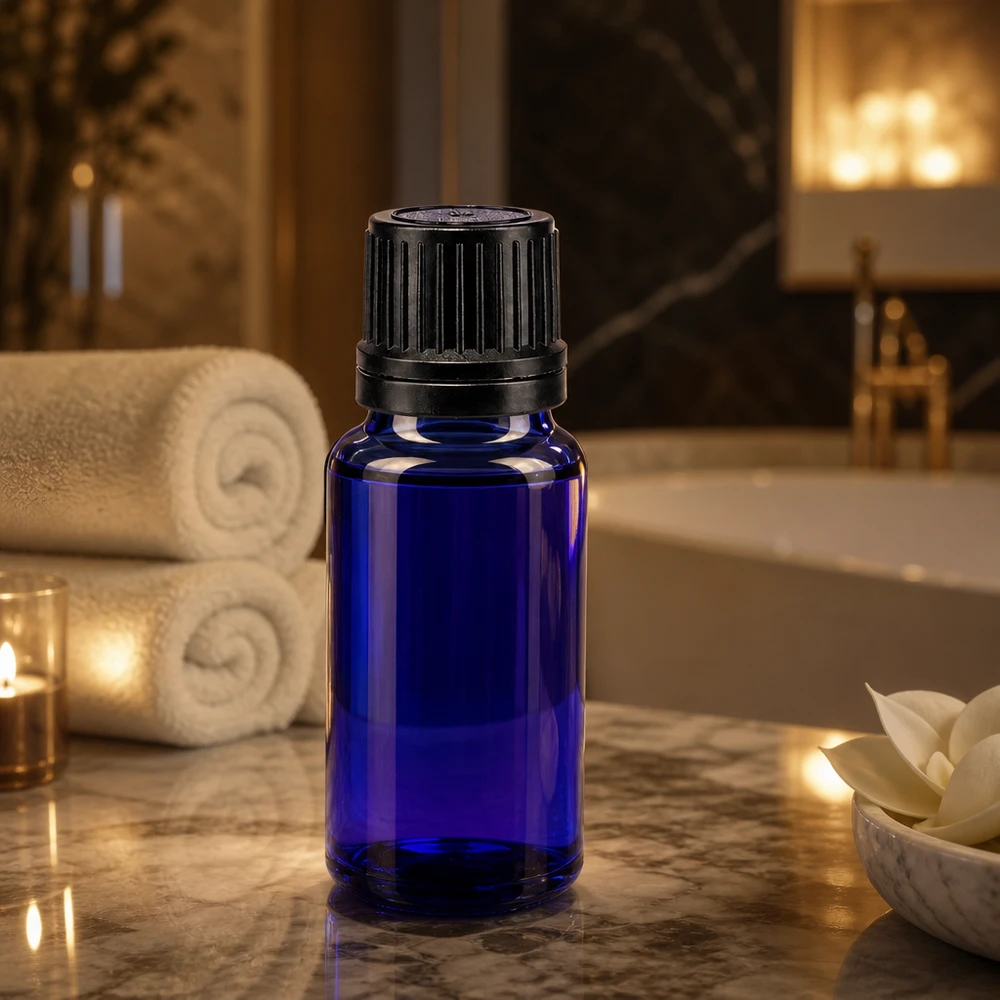 Zylindrische 20ml Apothekerflasche in Kobaltblau mit schwarzem 8mm Originalitätsverschluss