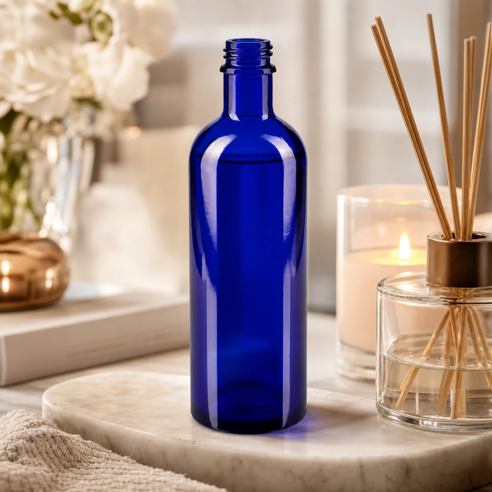 Nachhaltige Tropfflasche 200ml aus recycelbarem Blauglas mit standardisiertem DIN 22 Gewinde