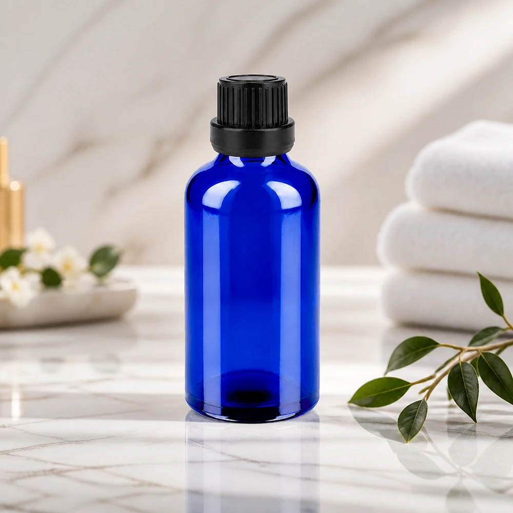 Premium Glasverpackung 50ml in elegantem Blau mit schwarzem Verschluss für hochwertige Produkte