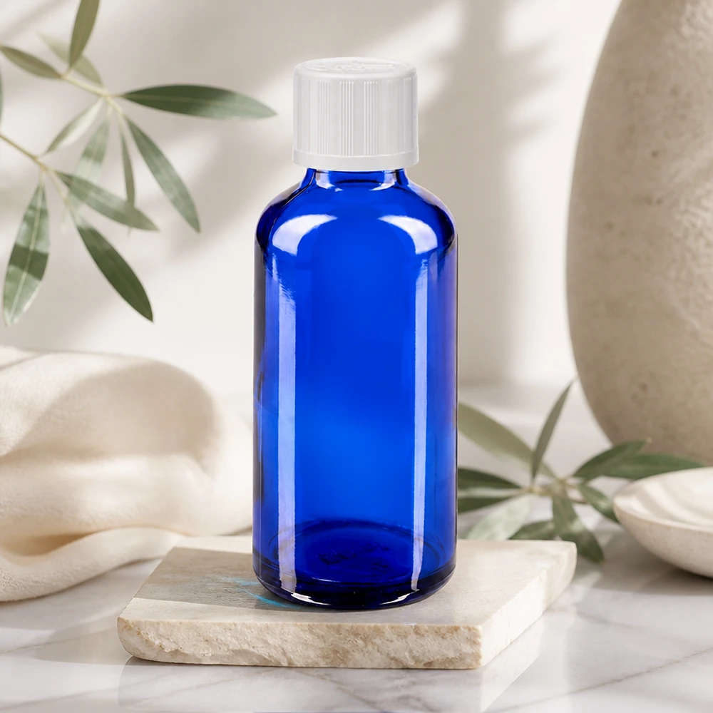 Apothekenflasche blau 50ml Tropfverschluss weiß Kindersicherung Standard Blickdichte kobaltblaue Glasflasche 50ml mit weißem Kindersicherheitsdeckel und Tropfeinsatz