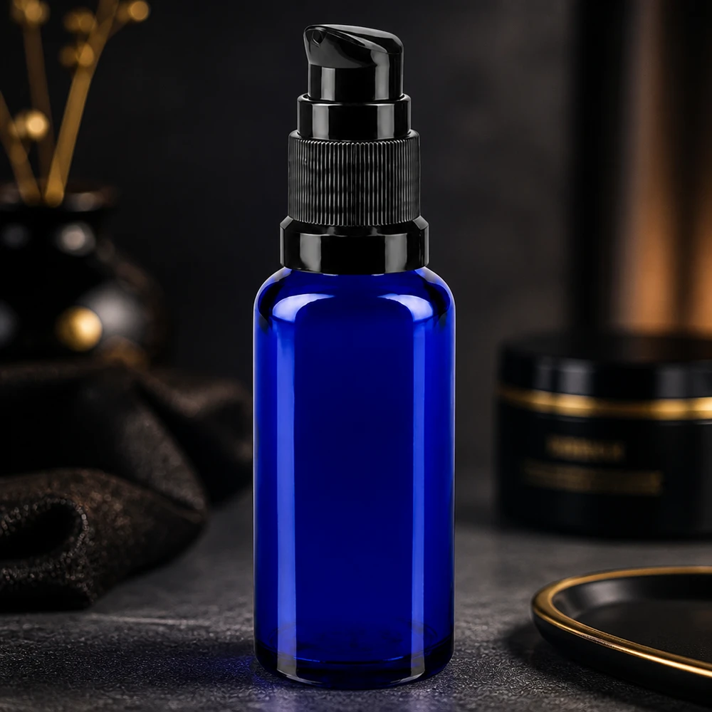 Hochwertige blaue 30ml Dosierflasche aus Apothekenglas mit schwarzem Pumpaufsatz STD