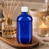 Kompakte blaue Vorratsflasche 100ml aus UV-Schutzglas mit weißem Deckel für Öle und Tinkturen