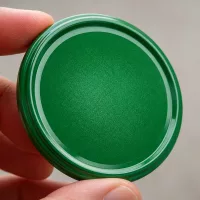 Glänzend grüner 82mm BasicSeal TO82 Deckel mit gewelltem Rand aus Weißblech