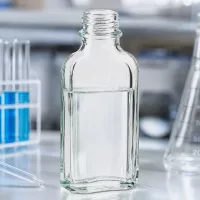 Glasflasche Meplatform 50 ml klar mit abgeflachtem Korpus und DIN22 Verschluss