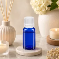 10ml Glasflasche in Apothekenblau mit weißem Kinderschutzverschluss für sichere Dosierung