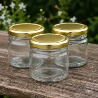 Dekorative Rundgläser 33ml Klarglas mit goldfarbenem Deckel für Dips und Saucen UNiTWIST