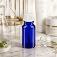 Blaue Tropfflasche 10ml Borosilikatglas mit weißem Verschluss lichtgeschützte Aufbewahrung