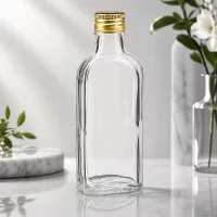 Hochwertige 100ml Glasflasche flach klar mit goldenem Aluminiumverschluss PP22 leer unbefüllt