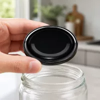 Lebensmittelechter UNiTWIST TO63 Deckel schwarz BioSeal BPA-NI mit Dichtungsrand Nahaufnahme