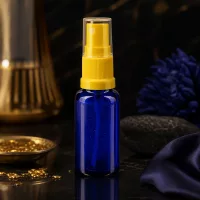 Zerstäuberflasche 20ml aus UV-schützendem blauem Glas mit gelbem Pumpspray ApoGlas