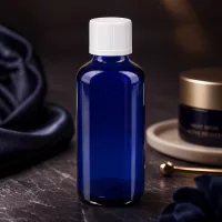 Zylindrische blaue Glasflasche 50ml mit geripptem weißem Kindersicherheitsverschluss 11mm