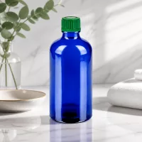 Nachhaltige 100ml Glasflasche in Blau wiederverwendbar und recycelbar für umweltbewusste Anwender