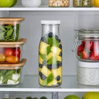 UNiTWIST Glasflasche 150ml weißer Deckel als Meal-Prep-Lösung im gut sortierten Kühlschrank