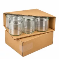 Professionelle Verpackung von 1062ml Rundgläsern in Kartons zeigt sichere Lieferung der Vorratsgläser
