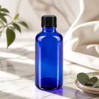 Lichtschutzflasche 50ml in Blauglas mit schwarzem Kunststoffverschluss für Aromatherapie