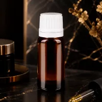 Nachfüllbare 10ml Braunglas Aromaflasche mit weißem Tropfverschluss und 0,7mm Dosierspitze