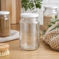 1062ml Rundglas BasicSeal Deckel leer auf Küchentheke mit Vorratsgläsern und Küchenutensilien Zero Waste Küche