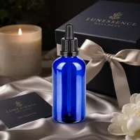 Edle kobaltblaue Glasflasche 100ml mit schwarzem Pipettenverschluss für hochwertige Beauty-Produkte