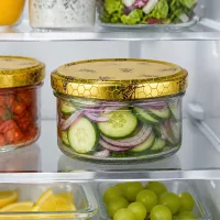 UNiTWIST BasicSeal Deckel Bienenwabe gold auf 186ml Rundglas mit frischem Gemüse im Kühlschrank