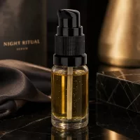 Zylindrische 10ml Glasflasche mit schwarzem Dosierpumpkopf für hochwertige Pflegeseren