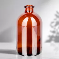 Sterile Glasflasche 100ml in Bernsteinfarbe mit charakteristischer Apothekerflasche-Silhouette