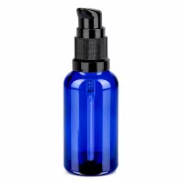 Stilvolle kobaltblaue 30ml Flasche mit schwarzem Pumpverschluss für hochwertige Pflegeprodukte