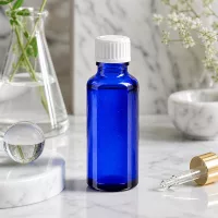 UV-Schutz Apothekerflasche blau 30ml mit weißem 11mm Verschluss für Öle und Tinkturen
