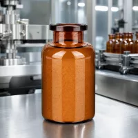 Zylindrische Injektionsflasche 20ml Braunglas gefüllt mit orangem Lyophilisat