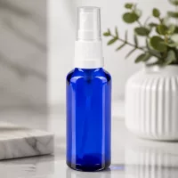 Wiederbefüllbare blaue Glas Sprühflasche 30ml für ätherische Öle und Seren